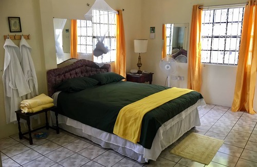 Colonarie House | Affordable Rooms near Argyle International Airport