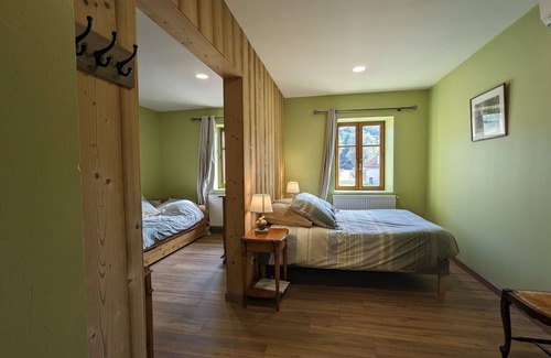 Rehaupal Bed & Breakfast | Air-conditioned family room with garden access