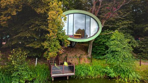 Radailiai Hotel | AKIS namelis medyje- Dinosaur Park