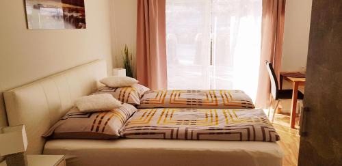 Finkenstein am Faaker See Apartment | Alpe-Adria Apartment Chanel (Top 6 mit Garten)