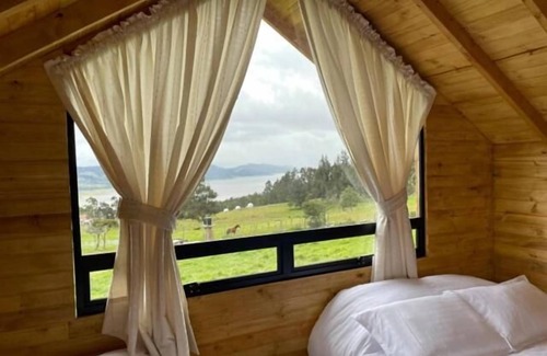 Guatavita Hotel | Altozano Cabañas