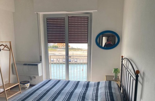 Castiglione della Pescaia Apartment | apartment with canal port view