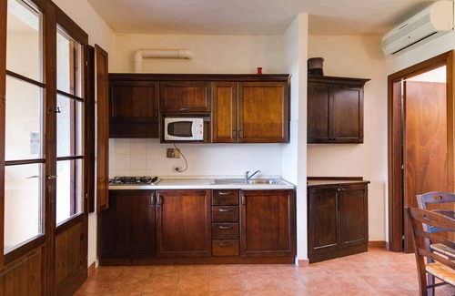 Orbetello Condo | Apartement with air conditioning and outdoor pool