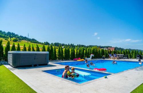 Bialka Tatrzanska Apartment | Aparthotel Rabiań-SKI ZEWNETRZNY BASEN ORAZ JACUZZI Z PODGRZEWANĄ WODĄ SALA ZABAW I DMUCHANIEC