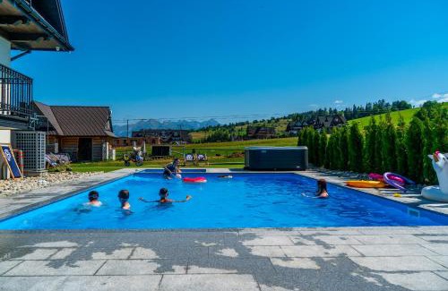 Bialka Tatrzanska Apartment | Aparthotel Rabiań-SKI ZEWNETRZNY BASEN ORAZ JACUZZI Z PODGRZEWANĄ WODĄ SALA ZABAW I DMUCHANIEC