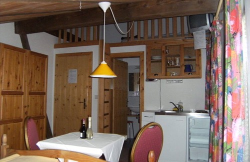 San Nicolo d'Ega Apartment | Apartment 7 with gallery bunk in the cozy attic with mini kitchen.