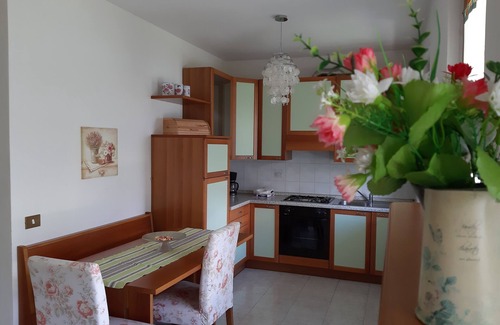Assenza Apartment | Apartment Agnese with lake view, swimming pool, garage and private garden.