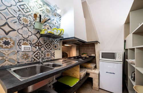 Uggiano la Chiesa House | Apartment 'Appartament Uccio' with Shared Terrace, Wi-Fi and Air Conditioning