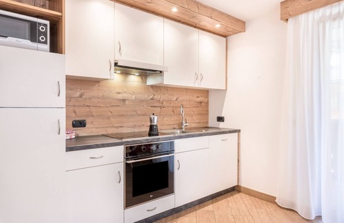 Canazei Apartment | Apartment Ciasa Rosa with Mountain View, Balconies & Shared Garden