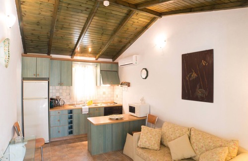 Ag. Georgios Apartment | Apartment 'Frini One-Bedroom' with Shared Pool, Wi-Fi and Air Conditioning