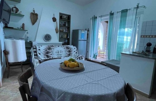 Sas Linnas Siccas Condo | Apartment in villa with direct access to the sea, suitable for families with children