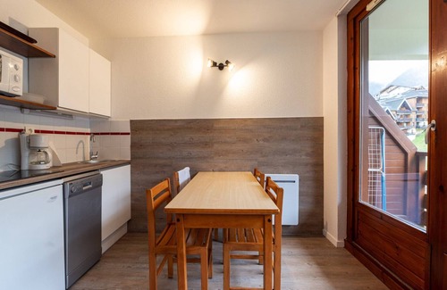 Les Esserts Apartment | Apartment in Morillon with Pool & Mountain Views