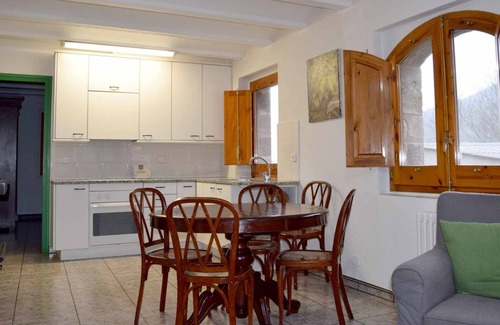 Santa Pau Apartment | Apartment 'Mas El Carrer - Verd' with Shared Pool, Shared Garden and Wi-Fi