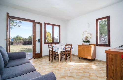 Budoni Apartment | Apartment 'Nibaru 1 Mare' with Shared Terrace, Shared Garden and Wi-Fi