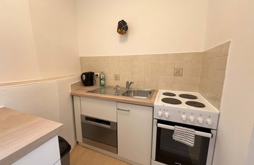 Bad Aussee Apartment | Apartment Theresa | Kitchen | Parking | Garden