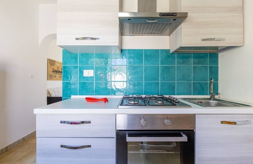 Punta Braccetto Apartment | Apartment 'Tortora' with Private Terrace, Wi-Fi and Air Conditioning