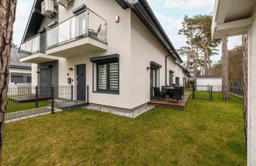 Dziwnowek Apartment | Apartment with Garden 450 m to the Beach by Rent like home
