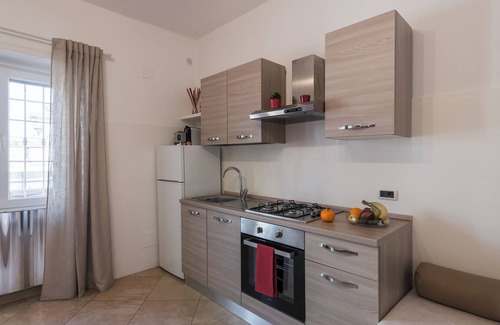 Fiumicino Apartment | Apartment with terrace, close to Leonardo da Vinci airport and the sea