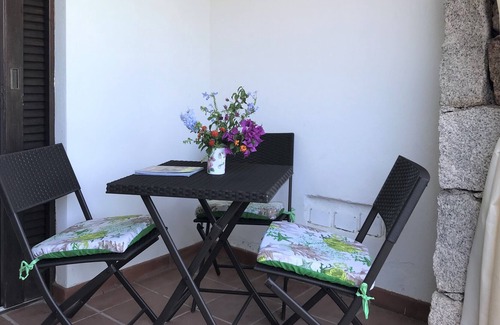 Porto San Paolo Apartment | Appartamento a Pochi Passi dal Mare con Patio e Giardino Privato