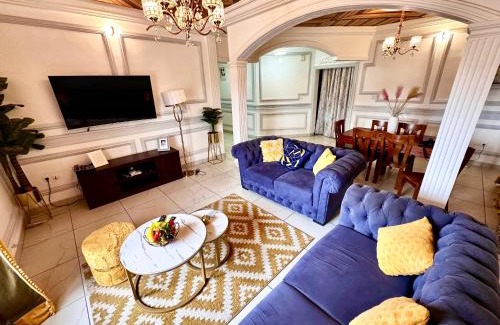 Douala Apartment | Appartement 2 et 1 chambres salon balcon canal sat wifi Netflix parking gardien 24 sur 24