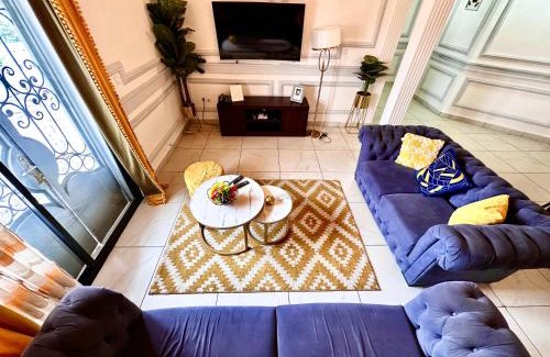 Douala Apartment | Appartement 2 et 1 chambres salon balcon canal sat wifi Netflix parking gardien 24 sur 24