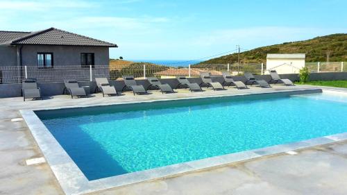 Olmeta-di-Tuda Apartment | Appartement charmant à Olmeta di Tuda avec piscine partagée