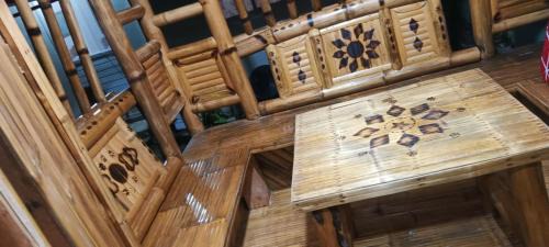 San Juan House | Aremen Transient, Nipa Hut with shared main houses bathroom