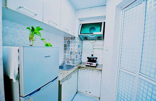 Nanshan Apartment | Avatar Young Lion Large Queen Bed & High Rise View
