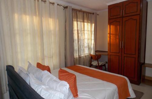 Syokimau Villa | Axis Garden Suites 8-Bedroom Villa Near JKIA & SGR Sleeps 16 Private Garden Retreat in Syokimau