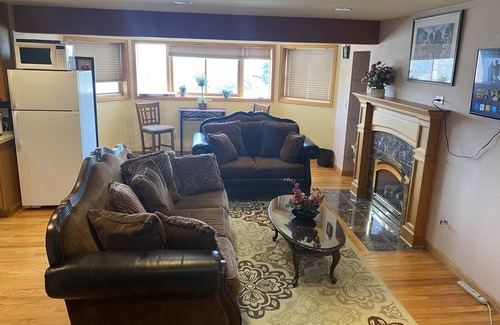 Lamar Heights Area Apartment | B. Spacious one-bedroom apartment in lower level with large windows