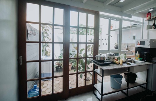 General Santos Apartment | Balai ni Zoe-Cheerful home with hot and cold shower and outside dining and bar