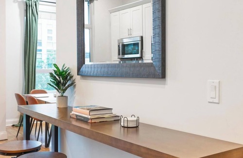 Near West Side Apartment | Balcony, Gym, 1 Garage Parking, Sleeps 10!