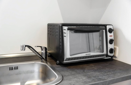 Harleshausen Apartment | Basement studio with king-size waterbed - good connection to the city center