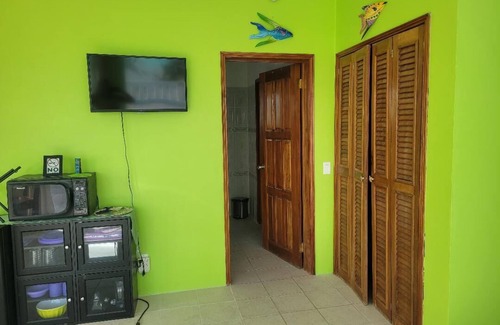 Boca Ciega Villa | Beach front in welcoming San Pedro w/AC, pool, fitness room, WiFi, kitchenette