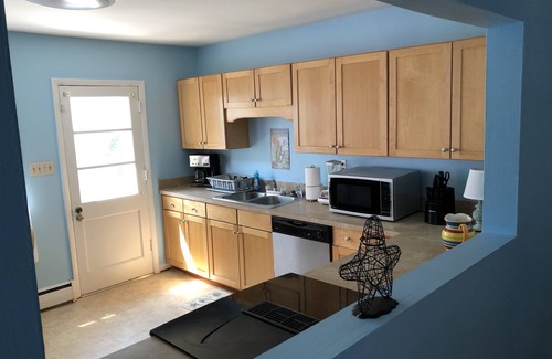 Cottage Line House | Beach Front on the Bay in our Rustic, Pet Friendly Cottage by RedAwning
