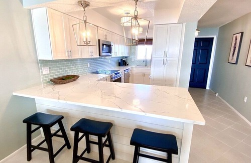 Crescent Beach Condo | Beachfront Dream! Free Beach Service & Completely Remodeled! Pool & Tiki Bar