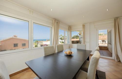 Urbanizacion Costabella House | Beachfront with Private Terrace, Garden, BBQ, and Garage in Marbella