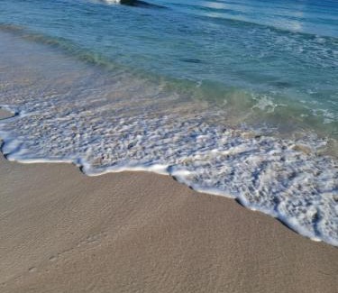 Silver Sands Apartment | Beachside calm, Footsteps to the sand and sea