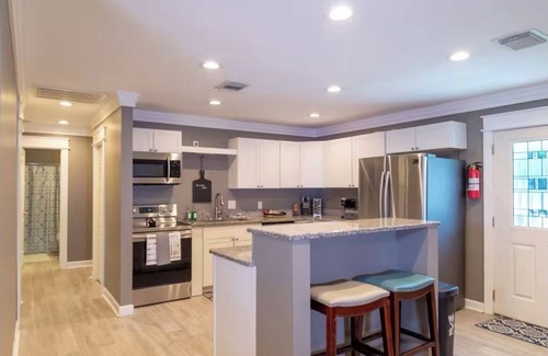 Highland City Apartment | Beachy Poolside Palm nestled between PCB, Mexico Beach and downtown PC.