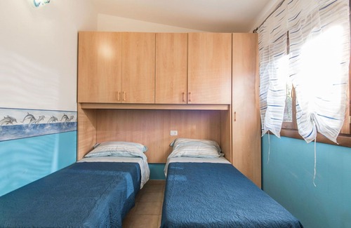 Riotorto House | Beautiful apartment in villa for 6 guests with internet, pool, TV, terrace, pets allowed and par.