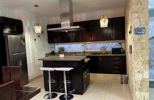 El Cortecito Apartment | Beautiful condo with pool view and private patio. Premier location near beach