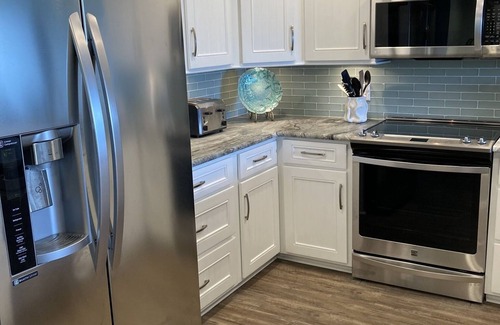 Pine Knoll Shores Condo | Beautiful First Floor Oceanfront Condo Steps to Beach and Pool