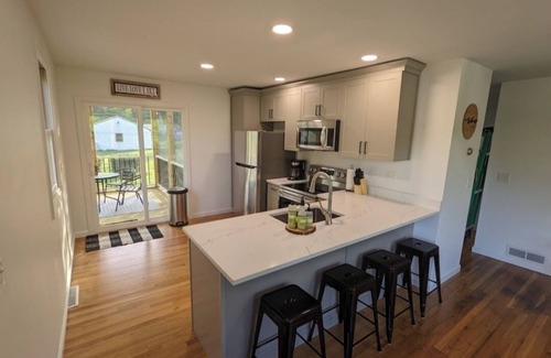 Raymond House | Beautiful home with 150ft sandy beach and private boat launch on Big Sebago!