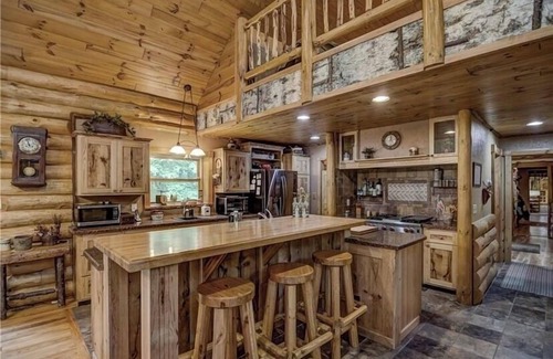 Trego House | Beautiful spacious secluded log home located feet from ATV/snowmobile Trails