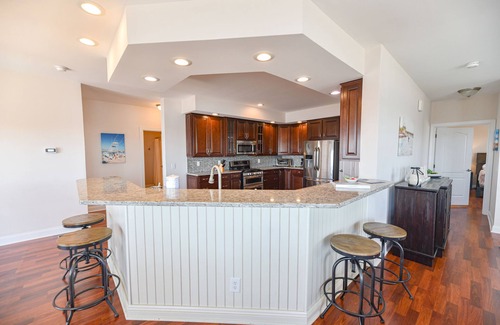 Long Neck House | Beautiful waterfront views, pools, beach, pet friendly!