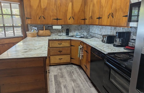 Florence House | Beaver Den Rustic lake housenright on shoals Creek and Wilson lake