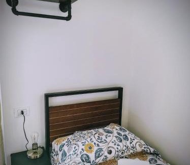 Finale Ligure Apartment | Bed on the Rocks