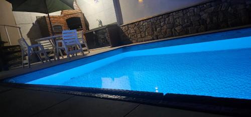 Jardim Imperador House | Belíssima Casa a Beira Mar com Piscina Aquecida Cobrado a Parte, 4 Quartos com Ar Condicionado, Amplo Salão de Jogos com Mesas de Bilhar e Pebolim, Amplo Espaço Externo com Churrasqueira em Deck Gourmet Coberto frente a Piscina, Tudo isso á Beira Mar
