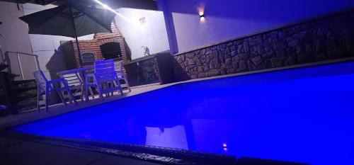 Jardim Imperador House | Belíssima Casa a Beira Mar com Piscina Aquecida Cobrado a Parte, 4 Quartos com Ar Condicionado, Amplo Salão de Jogos com Mesas de Bilhar e Pebolim, Amplo Espaço Externo com Churrasqueira em Deck Gourmet Coberto frente a Piscina, Tudo isso á Beira Mar