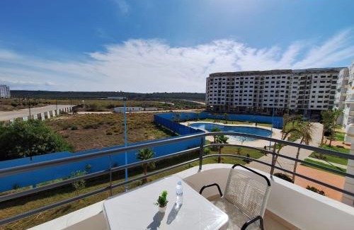 La Nouvelle Ville Ibn Batouta Apartment | Bel appartement climatisé, avec piscine et parking souterrain gratuit, à deux pas de la mer